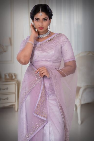 Lilac floral linen saree with woven zari borders