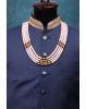 Baby Pink Mothi Mala With Golden Beads And White Stone Side Rings With A Triangle Structural Pattern In The Center Front