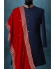 Saffron Red Elegant Grooms Sherwani With Golden Border Details
