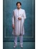Off White Jaquard Fabric Heavy Sherwani With Beadswork Along With Threadwork And Matching Pants With White Shawl