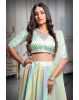 Mint Green Georgette lehenga With Heavy Detailed Deepcut blouse and Vibrant Ombre colour Shade Skirt And Matching Dupatta