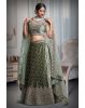 Sage Green Heavy Stone Worked Lehenga With Exquisite Detailing On Blouse And Dupatta