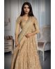A Radiant Gold Lehenga With Detailed Mirrorwork And Zari, Paired With A Soft Net Dupatta For An Elegant Finish.