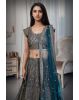 Cobalt Blue Heavy Handworked Bridal Lehenga With Golden Embellishments All Over The body And Beads Hanging In Waistline And Sleeve