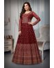 Red Anarkali Gown with Intricate Golden Embroidery and Sheer Sleeves.