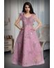 lavender pink a soft, pastel shade of purple with pink undertones. It also features shimmering embellishments or sequins that add sparkle to the overall look.