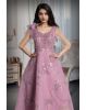 lavender pink a soft, pastel shade of purple with pink undertones. It also features shimmering embellishments or sequins that add sparkle to the overall look.