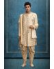 Golden Ivory Sherwani, Embellishment Set On The Neckline And Buttons. Paired Up With Raw Silk Fused Dhoti Pant