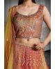 Orange And Yellow Ombre Shaded Lehenga With Heavy Embelishment Of Threadworks