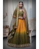 Mustard green and yellow silk lehenga