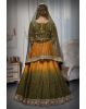 Mustard green and yellow silk lehenga