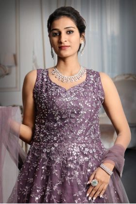 Purple Colour Heavy Stone work Net Sleeveless Gown With Exquisite Detailing