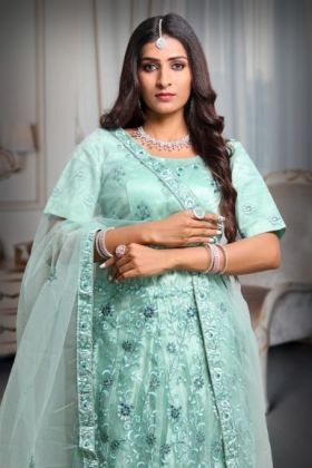 Heavy Threadwork Jade Green Lehenga  With Contrast Color Threadwork And Mirror work That Comes With Minimal Blose and Same Color Dupatta
