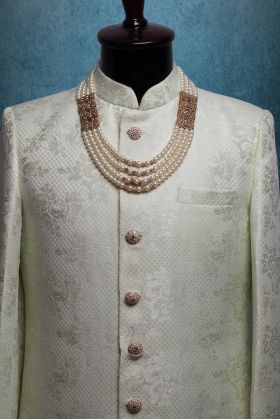 White and Matte Gold Colour Mothi Mala With Well Detailed Antique Block Lockets On Sides