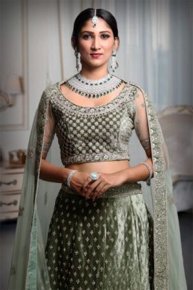 Sage Green Heavy Stone Worked Lehenga With Exquisite Detailing On Blouse And Dupatta