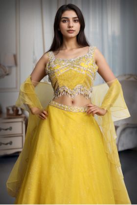 Yellow Haldi Lehenga Enriched With Beautiful Stonework With High Details On Blouse And Minimal But Uniform Detailing On Skirt