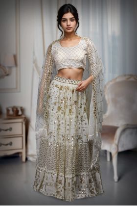 White Georgette Lehenga With Eccentric Golden Sequin Work With Heavy Detailed Blouse And Same Colour Dupatta