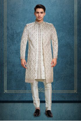 Ivory Jaquard Fabric Heavy Sherwani With Matte White Inner Kurtha And Matching Pants