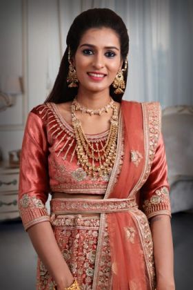 Dark Peach embroidery heavy border lehenga